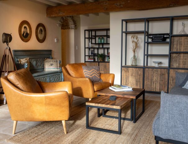 Image showing cosy living room in Gite Malepere "Bas" at Domaine de la Bade, a holiday rental in South France, for couples and families seeking a comfortable and peaceful place to stay.