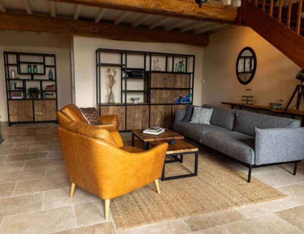 Image showing cosy living room in Gite Malepere "Bas" at Domaine de la Bade, a holiday rental in South France, for couples and families seeking a comfortable and peaceful place to stay.